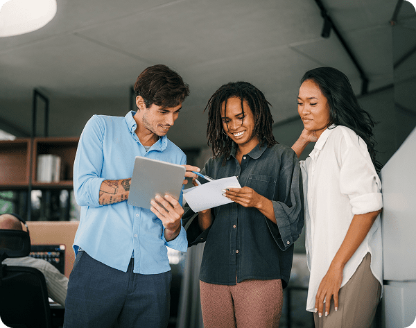Group reviewing documents in office setting